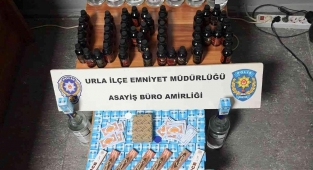 Urla'da kaçak içki ve sigara satışı yapan markete polis baskını